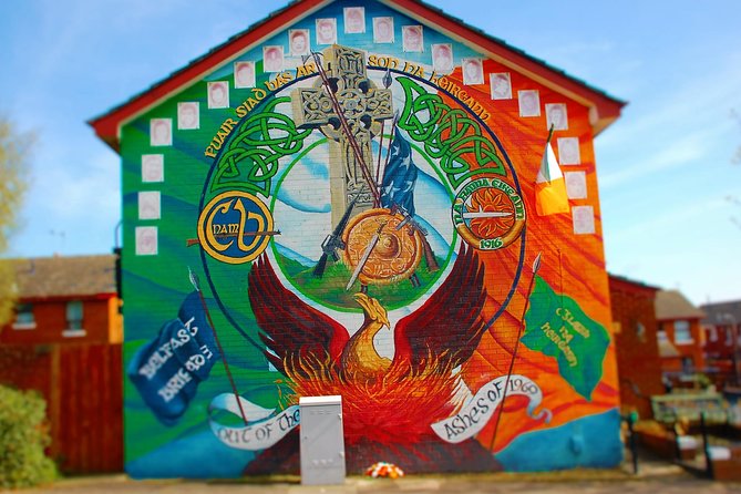 1 Hour Express Belfast Taxi/Cab Tour History, Murals, Troubles - Stop at Falls Road Library: bullet holes, then Bobby Sands across the street