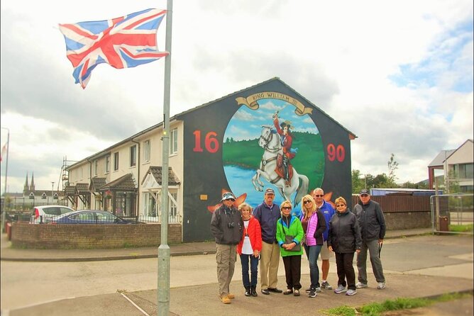 2 Hours Republican & Loyalist Mural Black Taxi Tour from Belfast - Stop 1: International Mural Wall on Divis Street