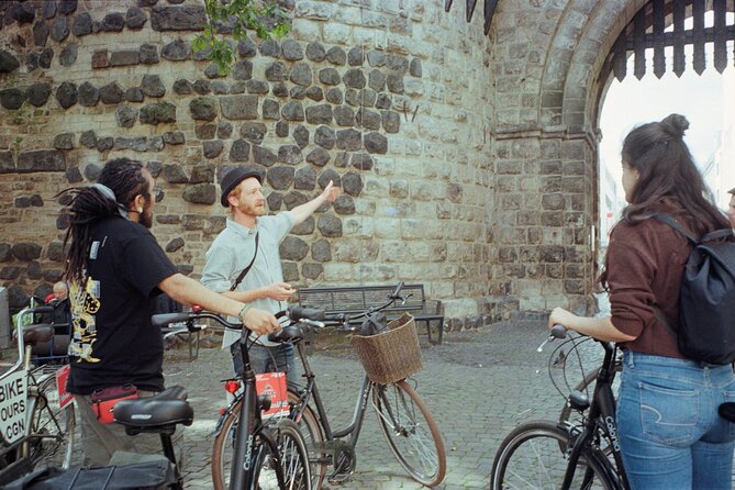 3-Hour Cologne Street Art Bike Tour in Small Group with Guide - Im Mediapark: picking favorites as you head back