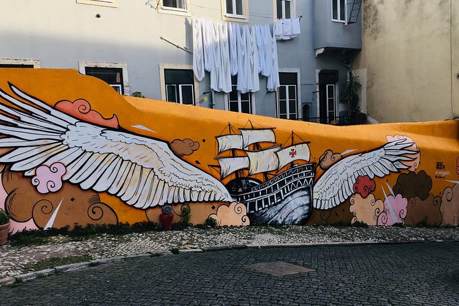 3-Hour Guided Street Art Walking Tour of Lisbon - Baixa: azulejos and cobblestone symbolism