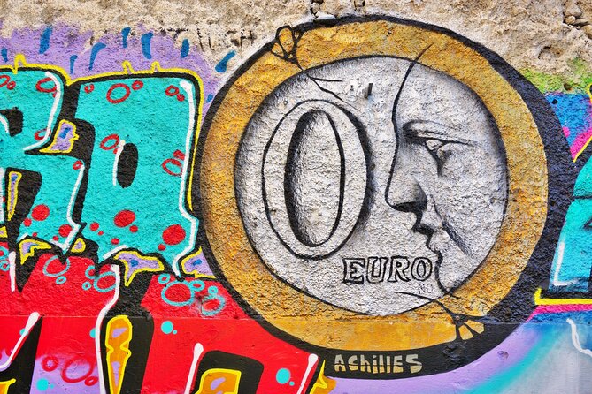 Athens Street Art - Private Walking Tour - Stop 4: Kerameikos’s ancient-meets-contemporary contrast and iNO’s DaVinci murals
