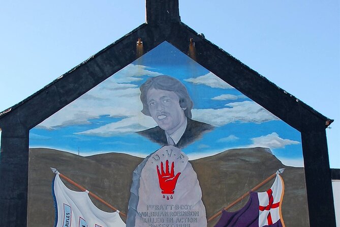 Award Winning Express 2 Hours Belfast Black Taxi/Cab tours - Stop 3: Divis Street International Mural Wall and the World Messages in Belfast