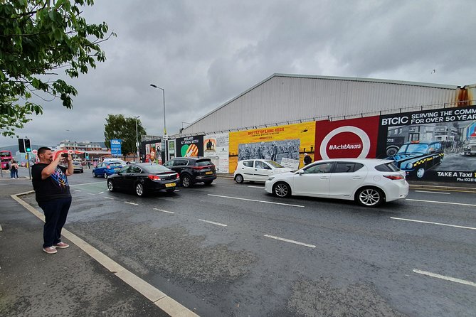 Belfast Cab Tour of Peacewalls, Murals and the Famous Titanic Slips - Getting around: pickup, private comfort, and mobile tickets