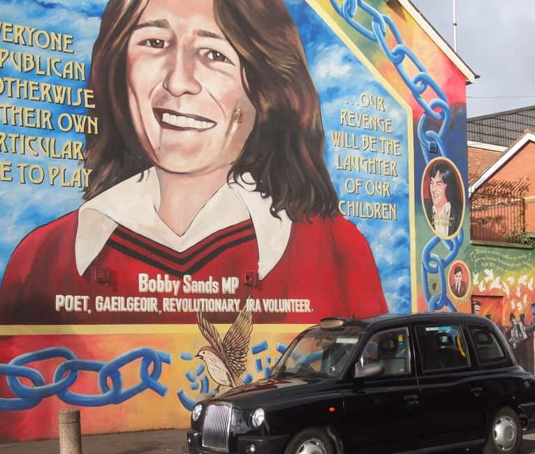 Belfast: Private Black Taxi Cab Political Murals Tour - Falls Road murals: the neighborhood story behind the wall
