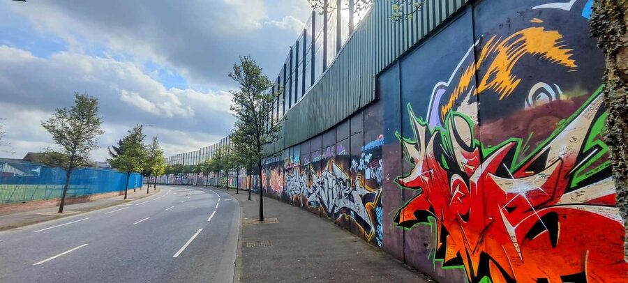 Black Taxi-Style Tour: Murals, Peace Walls & City Highlights - Cathedral Quarter, CS Lewis Square, and Titanic Quarter Lead Into the Big Finish