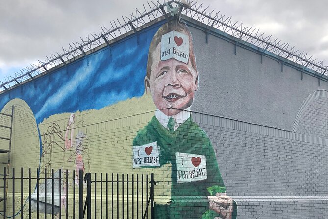 Black Taxi Tour of Belfast – Politics, Murals peace walls Tour - West Belfast to the Falls Road: Murals, Stopping Power, and St. Comgall’s