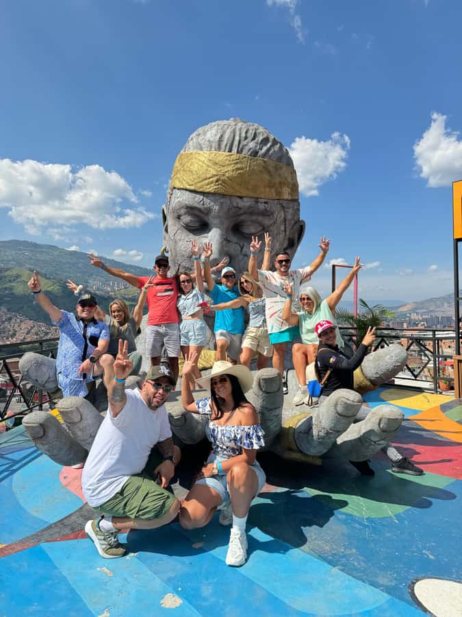 Complete Tour in Comuna 13: Graffiti, History and Street Delights - San Javier Meeting Point: Green Umbrella on Line B