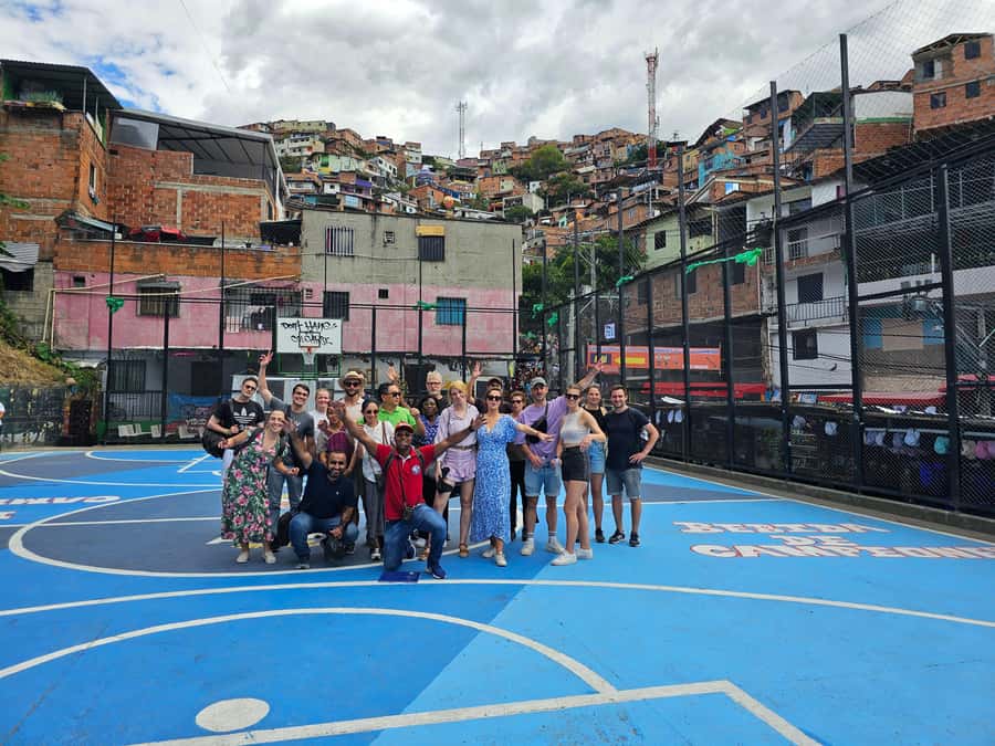 Graffiti Tour comuna 13 and cable car (made by local guides) - 20 de Julio by bus: getting into the neighborhoods instead of around them