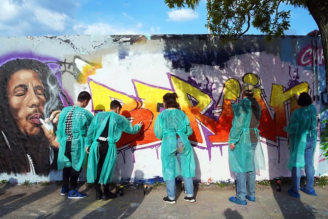 Graffiti Workshop Berlin with professional graffiti artists - Spray Can Skills on the Wall in Mauerpark (and Why Joint Spraying Works)