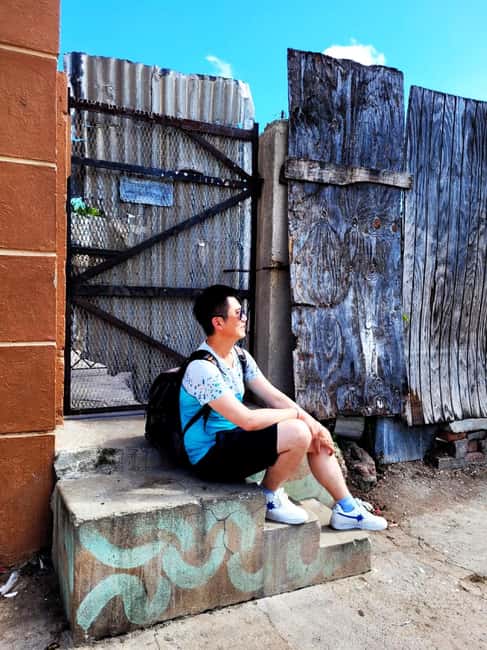 Kingston: Walking Tour with Mural Exploration - The history stop at the Institute of Jamaica: how the murals connect to the big story