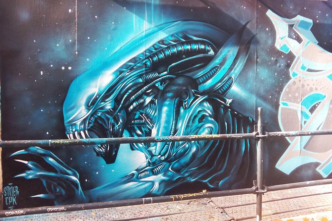 Lisbon Street Art Walk - Mouraria’s narrow lanes at Centro Comercial Mouraria: where the walking becomes the point