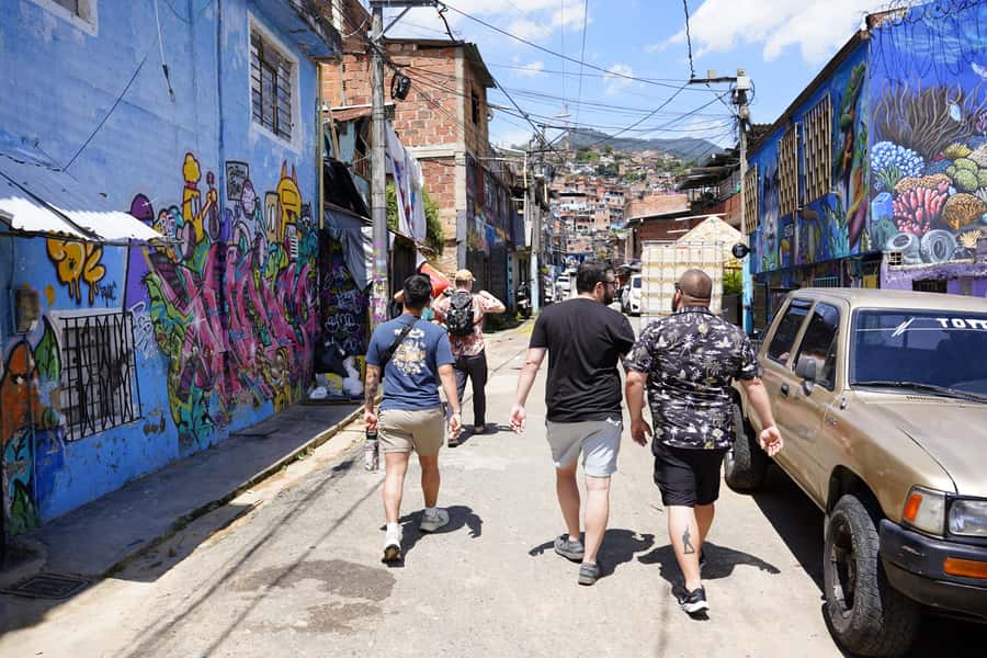 Medellín: Comuna 13 and Graffiti Guided Tour with a Local - The walk into lesser-known alleys: local shortcuts, not tourist detours
