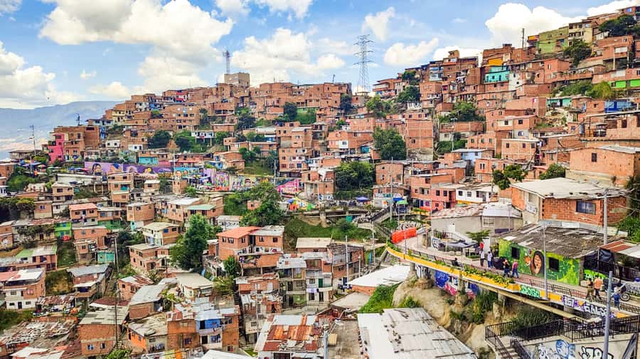 Medellin: Comuna 13 Graffiti Tour, Cable Car & Street Food - Riding Medellín’s Metrocable: The Mountain-View Part You’ll Remember