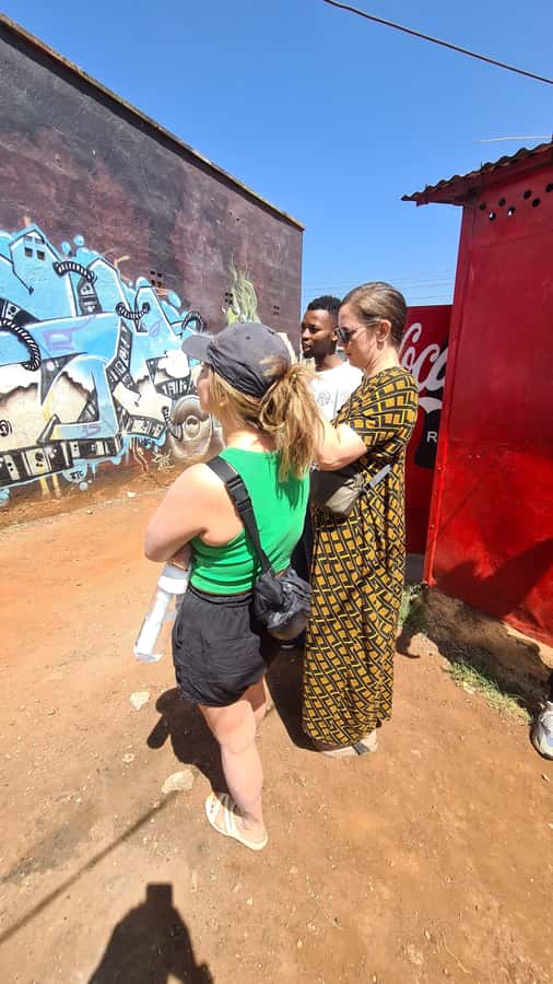 Nairobi: Kibera Street Art Tour with Local Artists - Entering Kibera through Sun Valley’s eyes