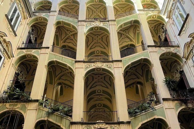 Naples Murals Catacombs and Folklore Sanità District Tour - Mercato dei Vergini: ending at a place where Naples eats
