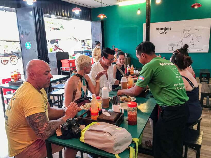 Phnom Penh: Street Art & Food Tour by Tuk-Tuk - Banh chaev at the restaurant: rice milk and turmeric in real life
