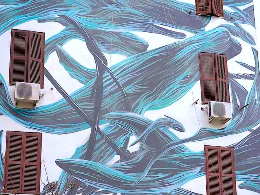 Rome street art tour: off the beaten path with a local guide - Garbatella Murals: Designed Space, Street Art, and Neighborhood Identity
