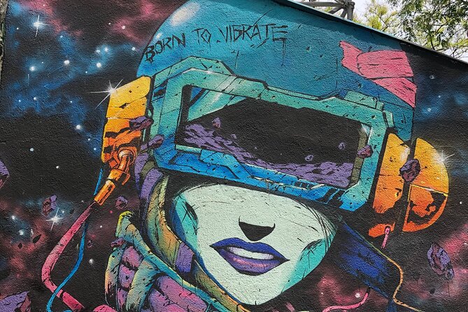 Street Art, Sculptures & Crime Stories Walking Tour – Barcelona - El Raval: murals, mosaics, and the neighborhood’s dark pivot