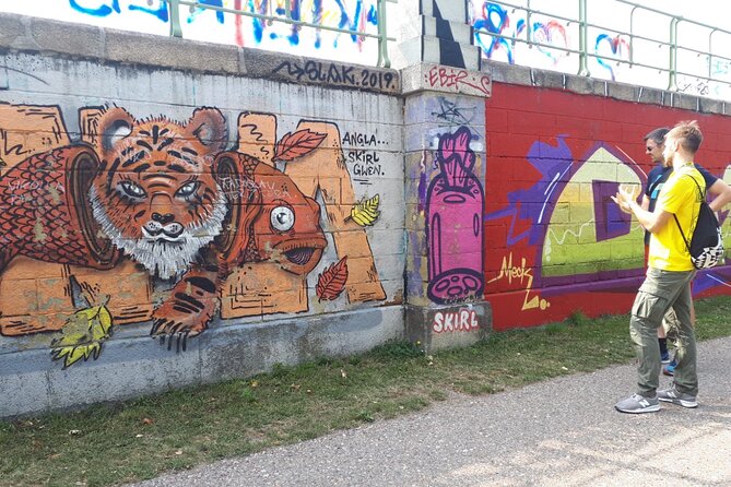 Street Art Tour in Vienna - Stop 4: Friedensbrücke, where overpainting is part of the story