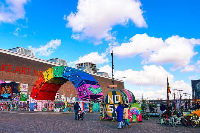 Street Art Walking Tour, private local Dutch guide - NDSM Wharf: Where Old Shipyard Walls Became Street Art Canvases