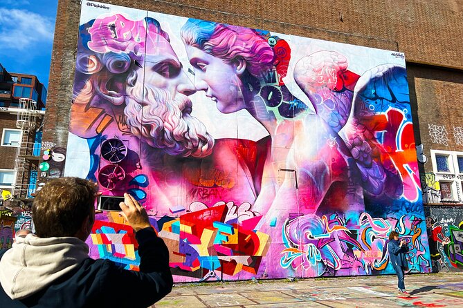 Street Art Walking Tour, private local Dutch guide - Red Light District: Canal Alleys, Bronze Details, and a Note on Comfort